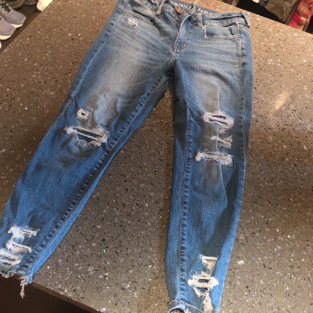 AE DISTRESSED SUPER STRETCH JEGGINGS